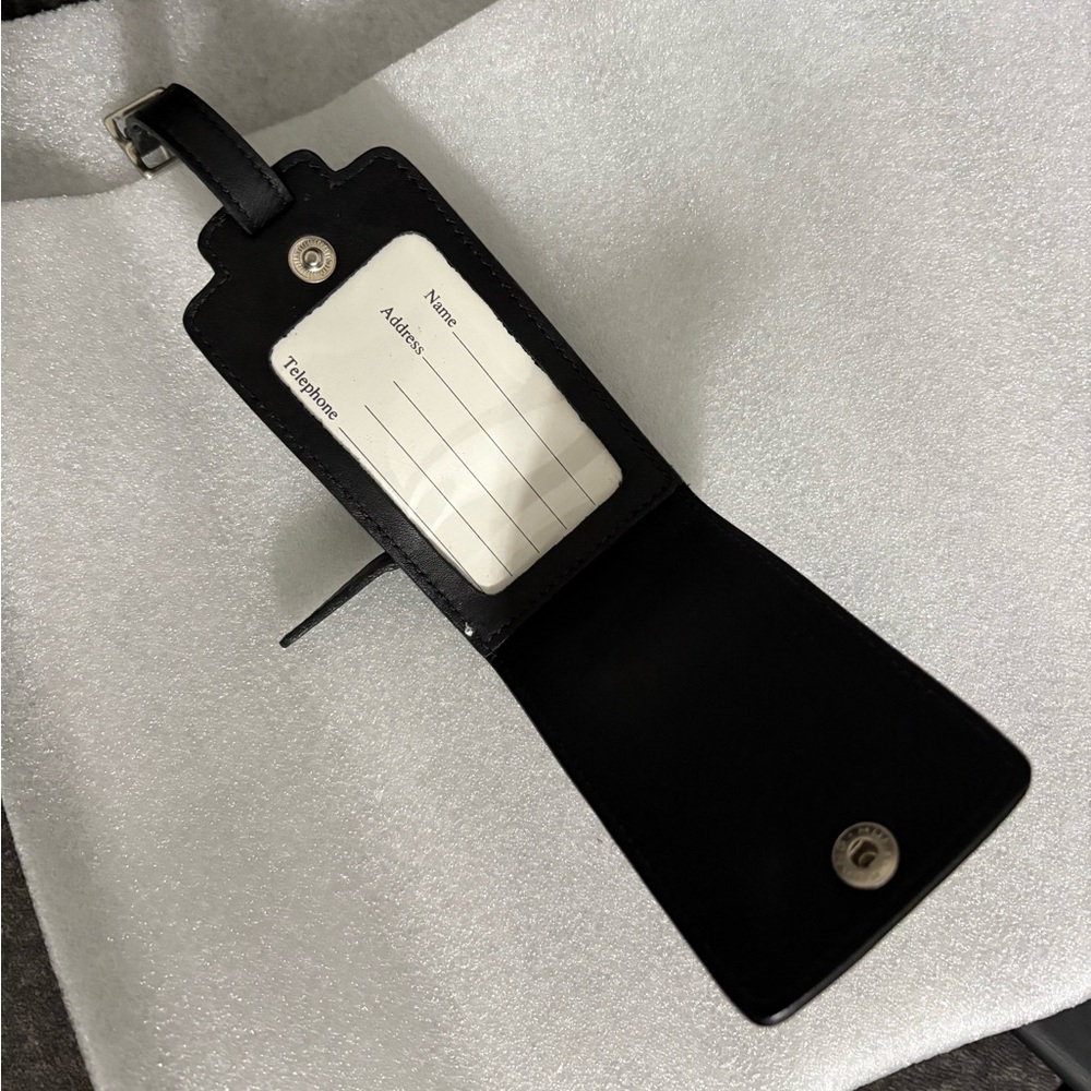 Coach Black Luggage Tag 2 available new without tags.